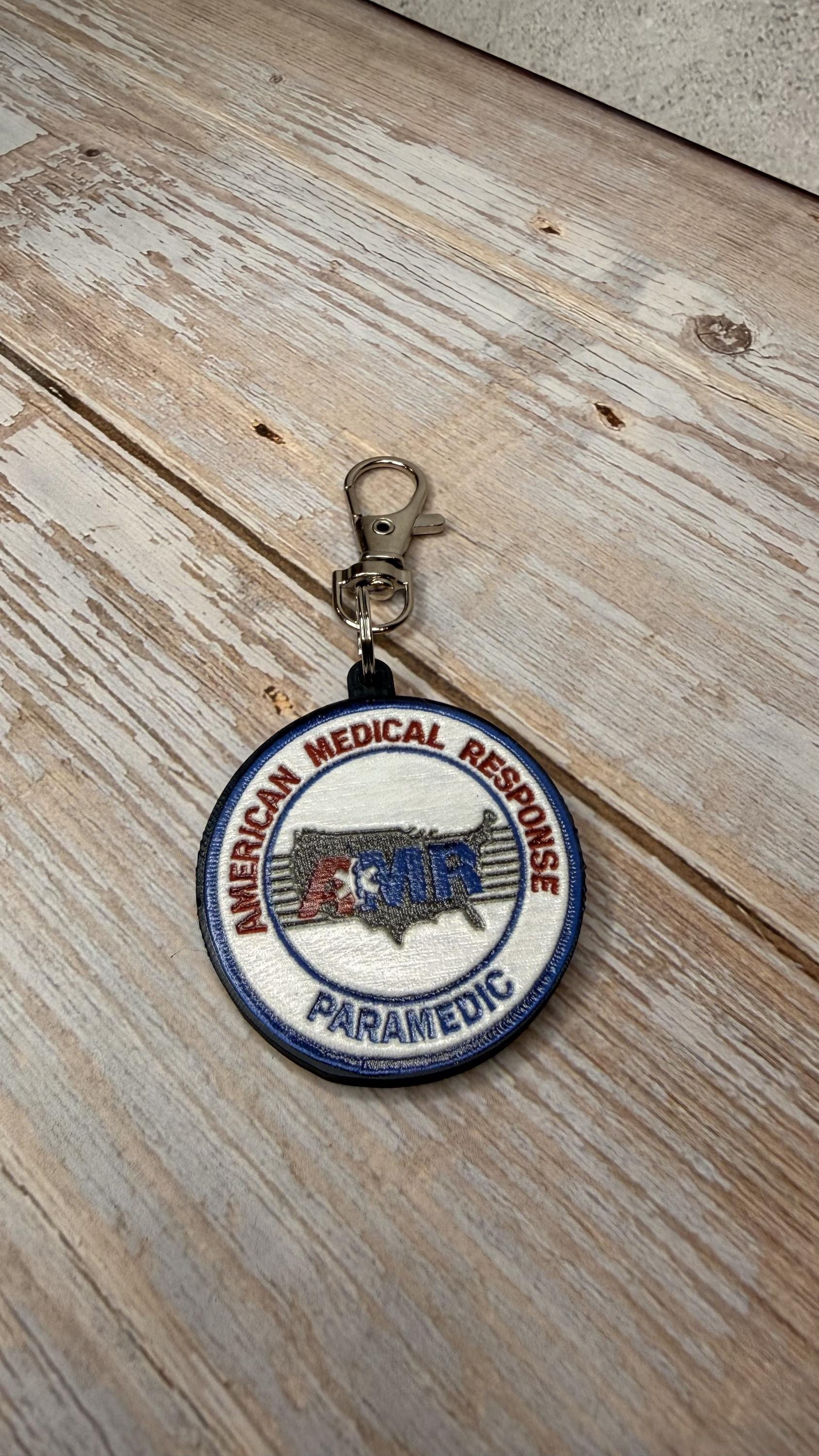 AMR Paramedic keychain on wood